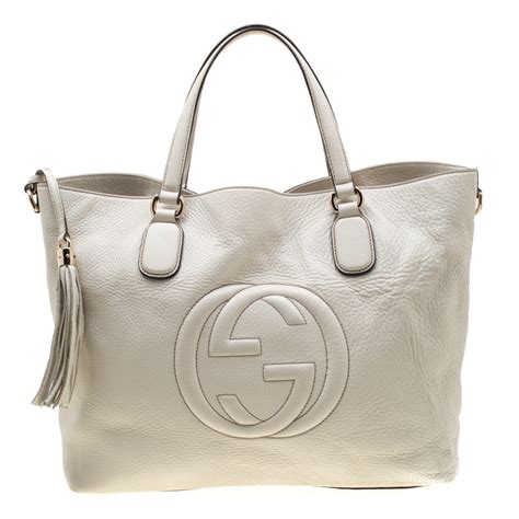 gucci cream leather handbag.